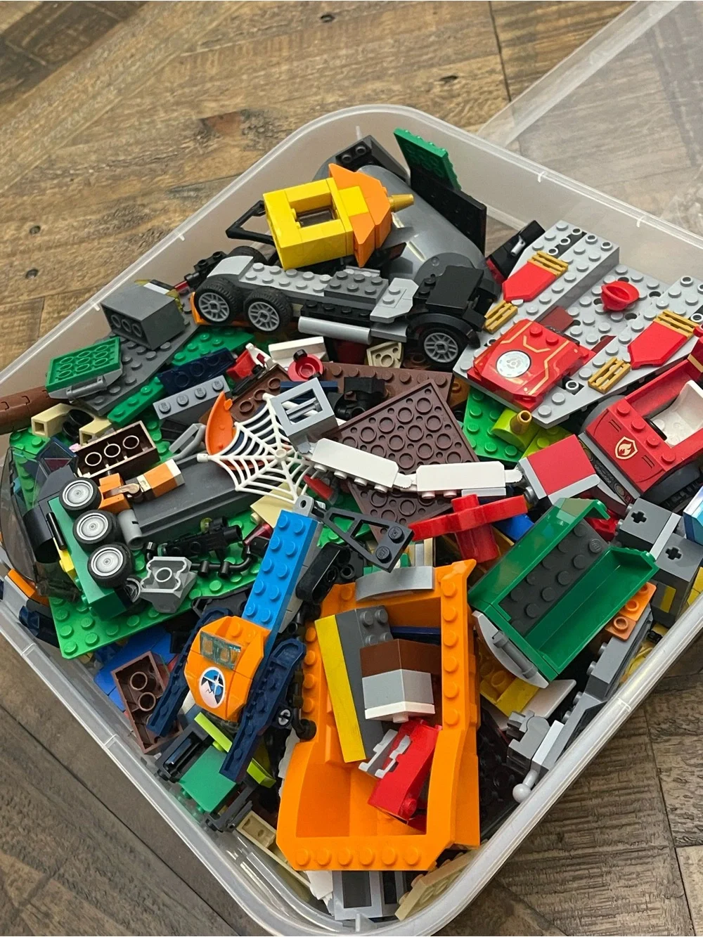 mixed assortment of LEGO brand bricks, plates, and specialty components
